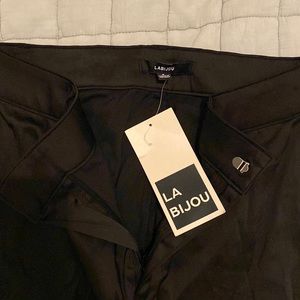 Black silky professional pants with zippers on both legs